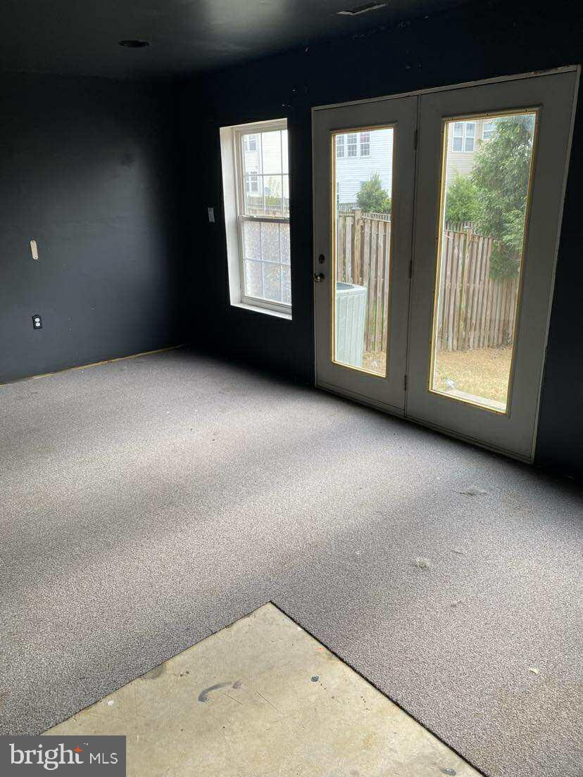 94 Eldon Drive Charles Town, WV 25414 - Photo 4 of 24 a view of an empty room with a window
