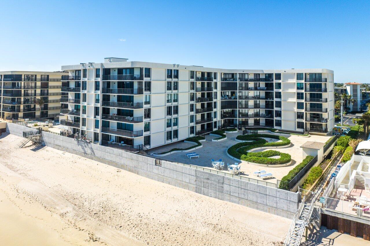 3610 South Ocean Boulevard, Unit 502 South Palm Beach, FL 33480 - Photo 41 of 51 a view of a pool with a patio