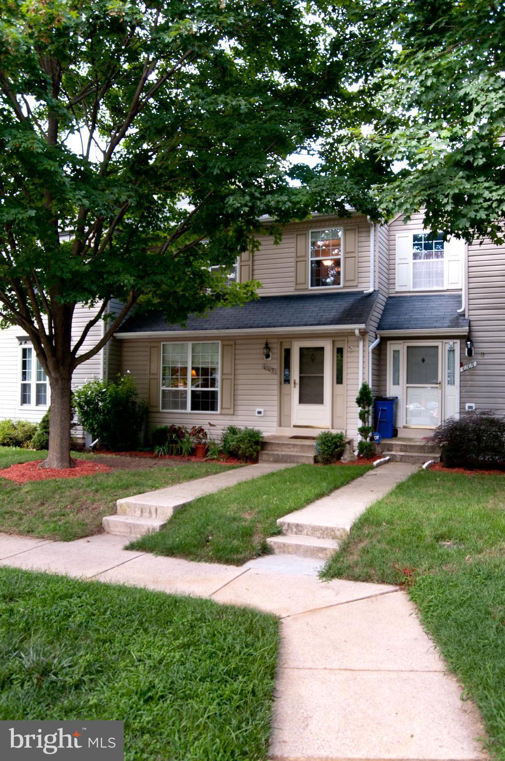 6163 Good Hunters Ride Columbia, MD 21045 - Photo 2 of 30 front view of a house with a yard
