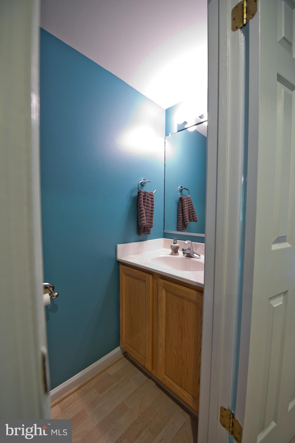 6163 Good Hunters Ride Columbia, MD 21045 - Photo 12 of 30 a room with a door and a table