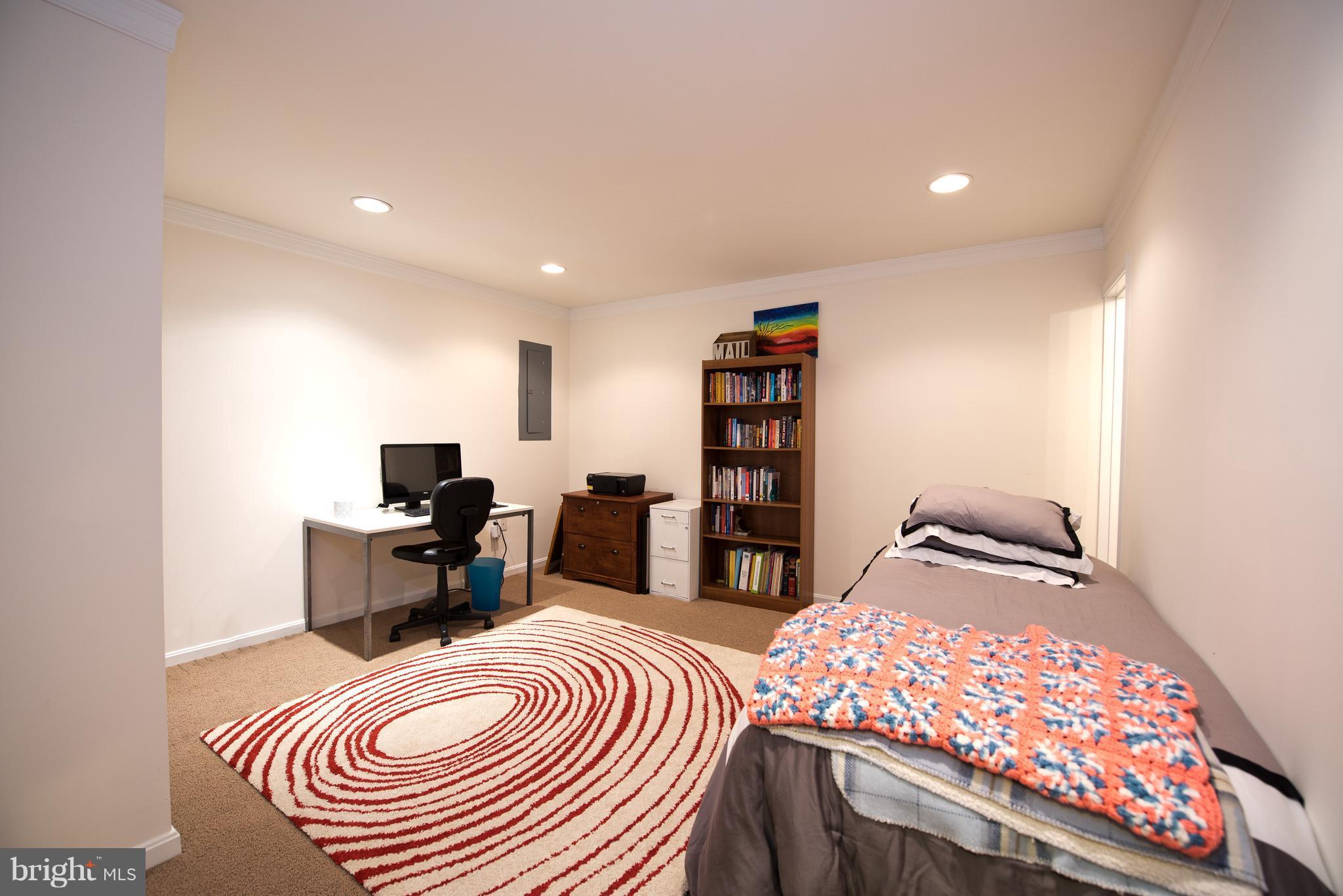 6163 Good Hunters Ride Columbia, MD 21045 - Photo 24 of 30 a bedroom with furniture and a bed