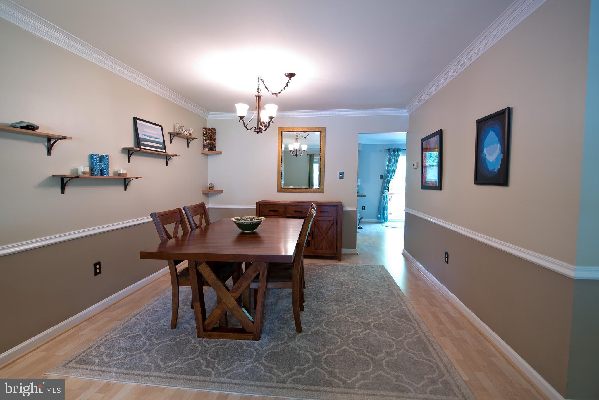6163 Good Hunters Ride Columbia, MD 21045 - Photo 6 of 30 a view of a dining room with furniture