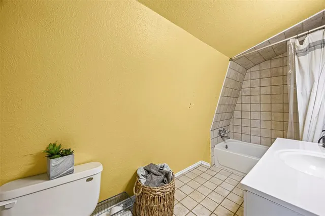 a bathroom with a sink and a shower