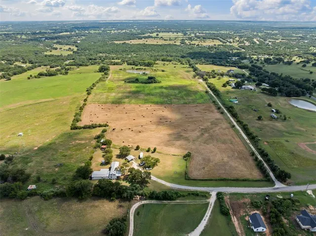 a view of a city with an ocean view
