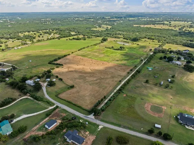 a view of a yard near a lake view