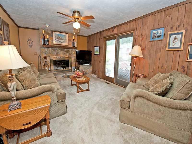 185 Brehm Road Washington, PA 15301 - Photo 3 of 22 Family Room. Family room highlighted by stone fireplace.