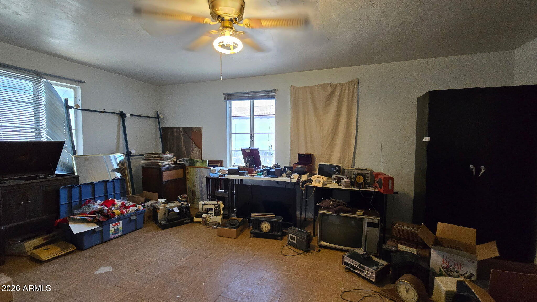 6803 South Miller Road Buckeye, AZ 85326 - Photo 14 of 50 a view of a workspace with furniture and a window