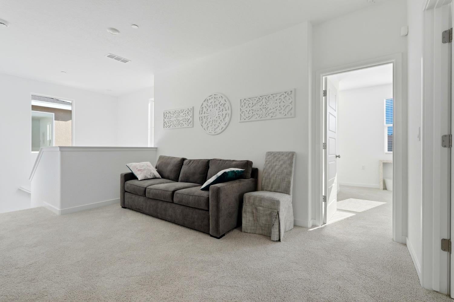 4225 Hampton Way Clovis, CA 93619 - Photo 19 of 37 a living room with furniture and a walk in closet