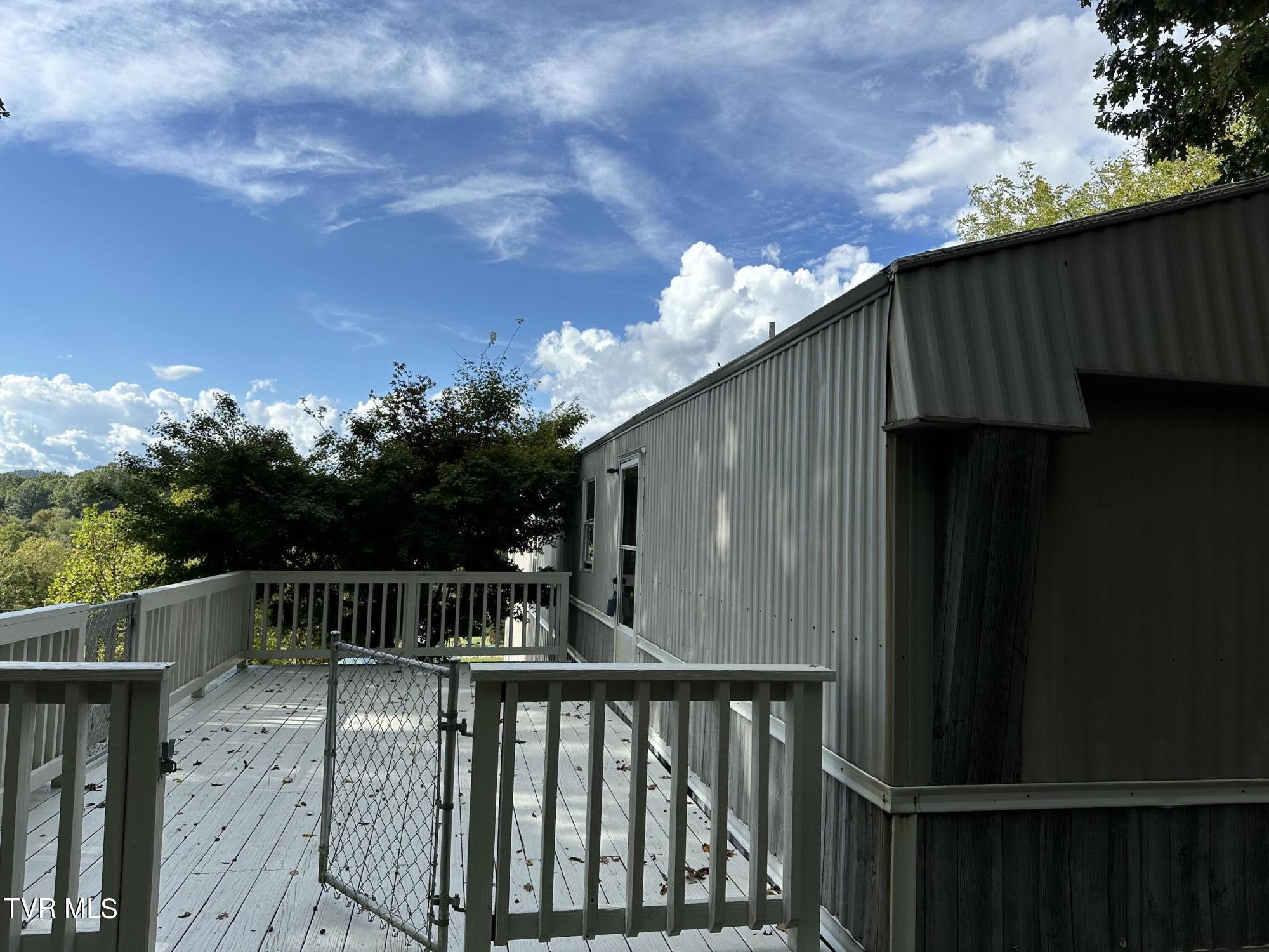 1370 Lovelace Road Fall Branch, TN 37656 - Photo 54 of 55 fenced deck too