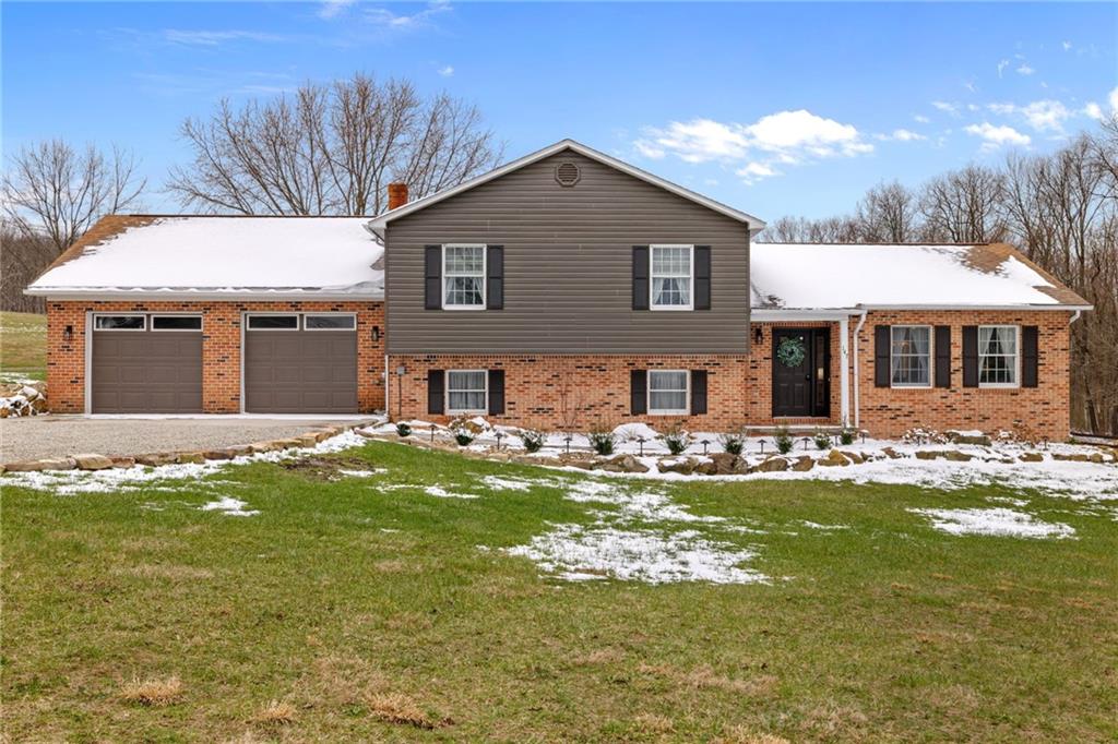 147 Fike Lane Addison, PA 15411 - Photo 1 of 50 a front view of a house with swimming pool having outdoor seating