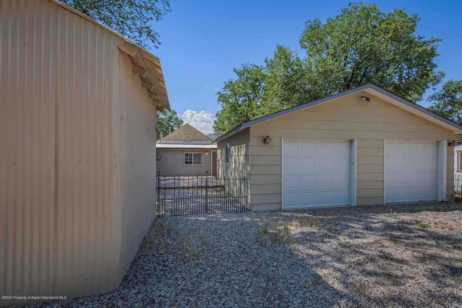 216 West 4th Street Rifle, CO 81650 - Photo 3 of 17 a view of a house with a yard