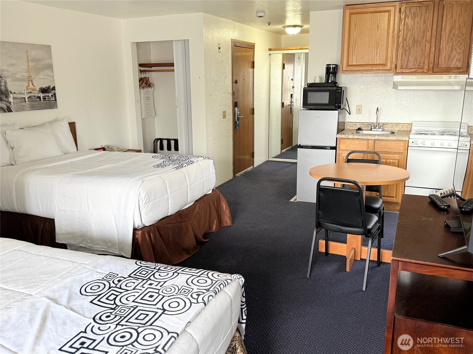 1120 North 91st Street Seattle, WA 98103 - Photo 11 of 23 a bedroom with a bed and furniture