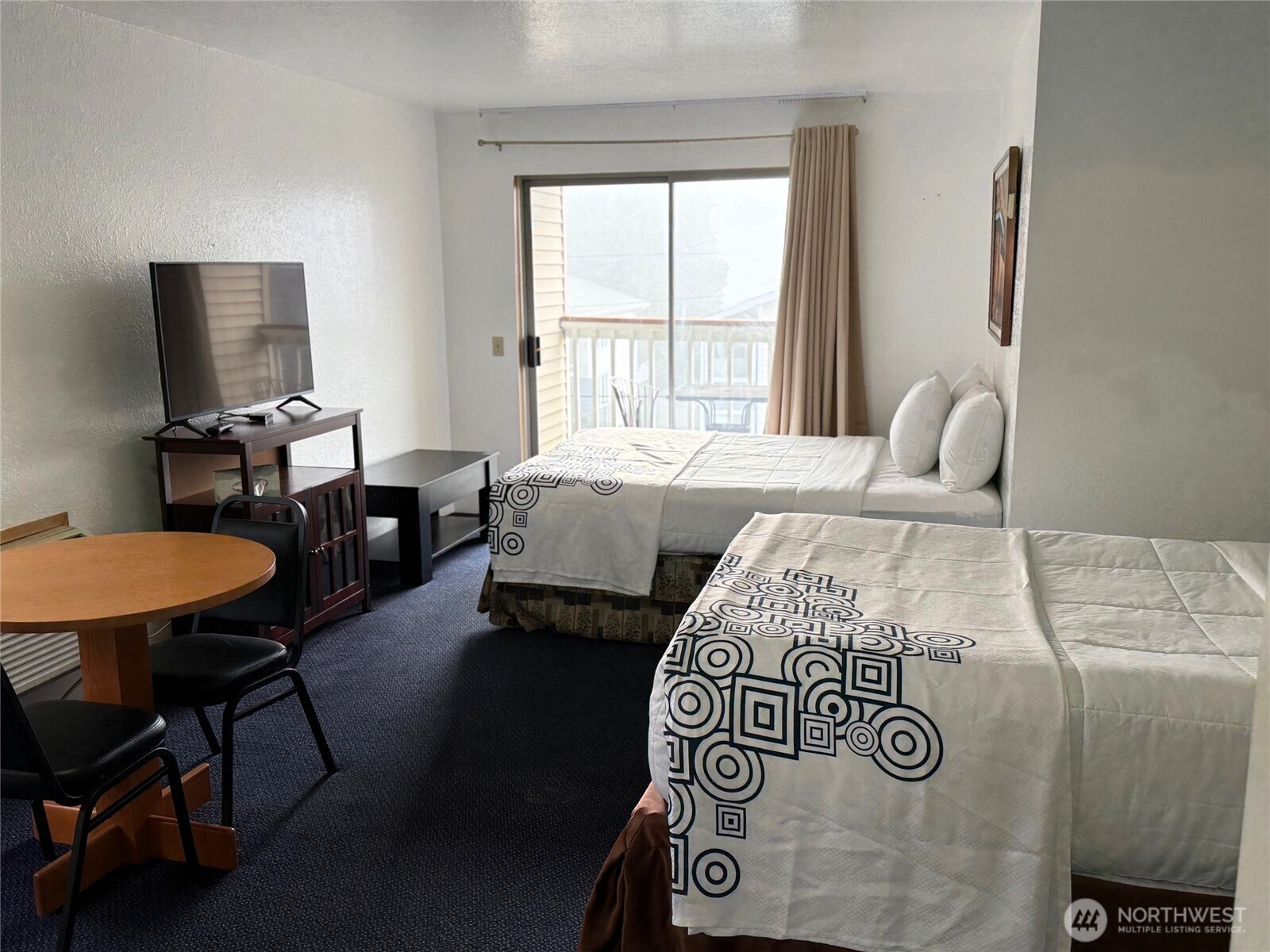 1120 North 91st Street Seattle, WA 98103 - Photo 14 of 23 a living room with furniture and a window