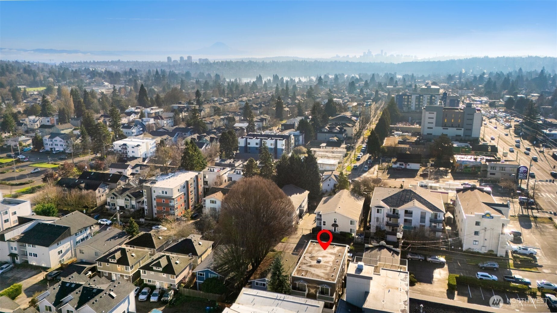 1120 North 91st Street Seattle, WA 98103 - Photo 23 of 23 an aerial view of residential houses with city view