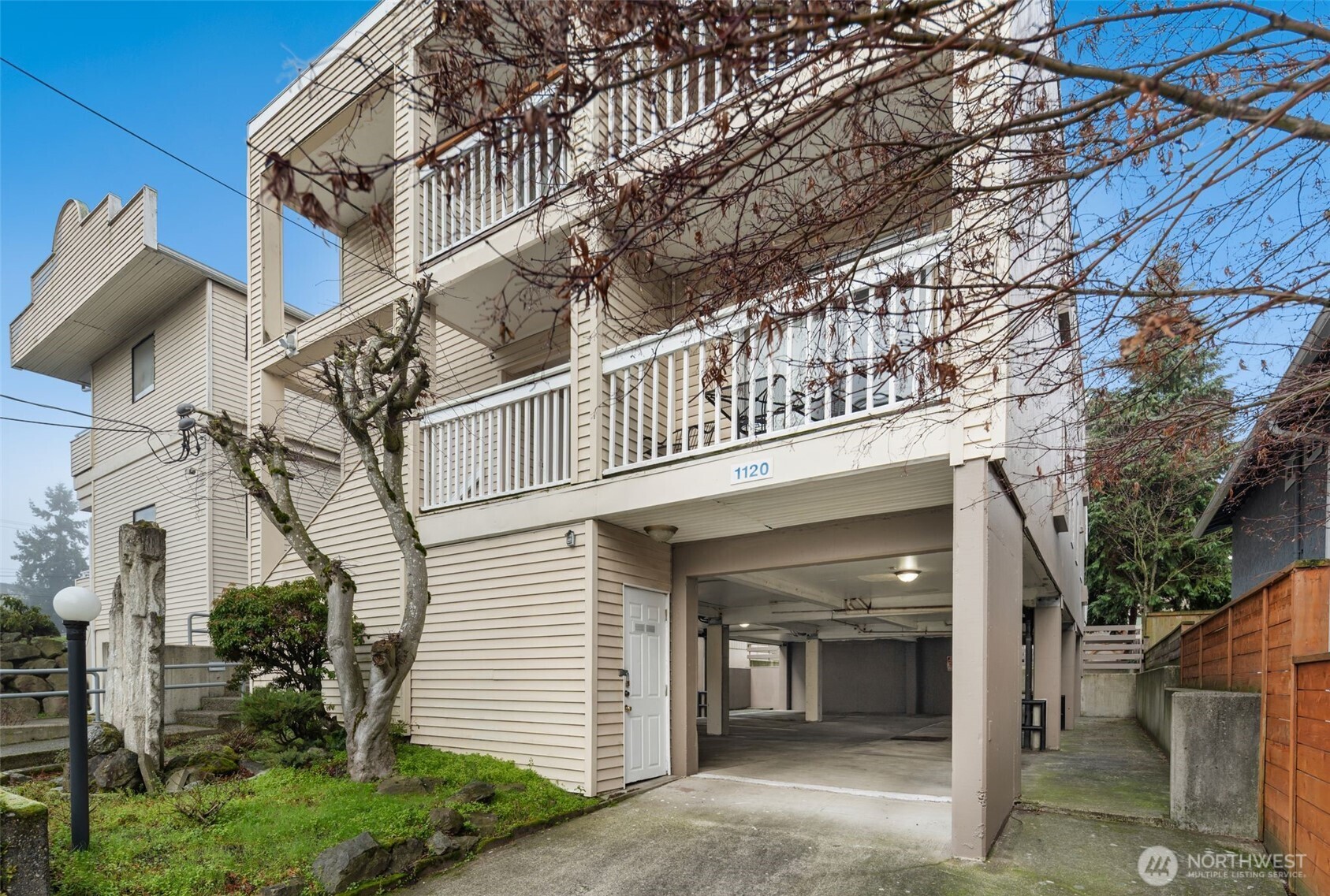 1120 North 91st Street Seattle, WA 98103 - Photo 3 of 23 a view of a house with a yard