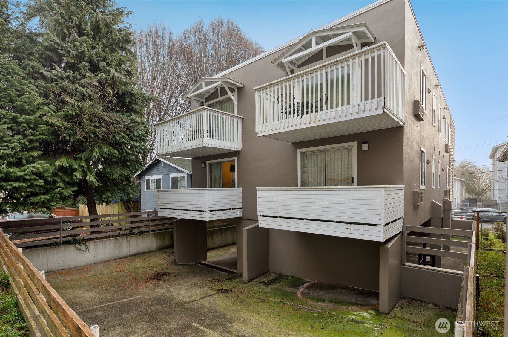 1120 North 91st Street Seattle, WA 98103 - Photo 7 of 23 a balcony with a table and chairs