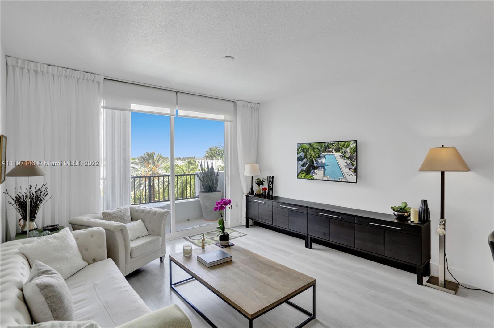 Imperial Point Fort Lauderdale, FL 33308 - Photo 18 of 37 a living room with furniture and window
