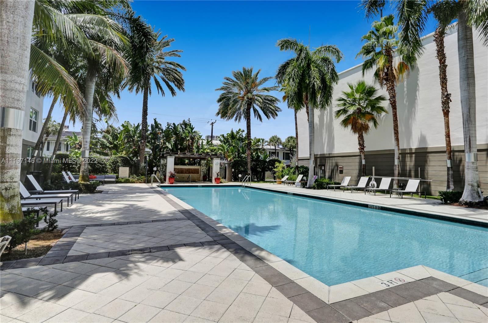 Imperial Point Fort Lauderdale, FL 33308 - Photo 24 of 37 a view of swimming pool with outdoor seating and plants