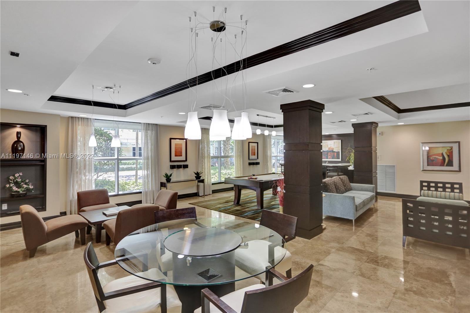 Imperial Point Fort Lauderdale, FL 33308 - Photo 32 of 37 a living room with furniture and a large window