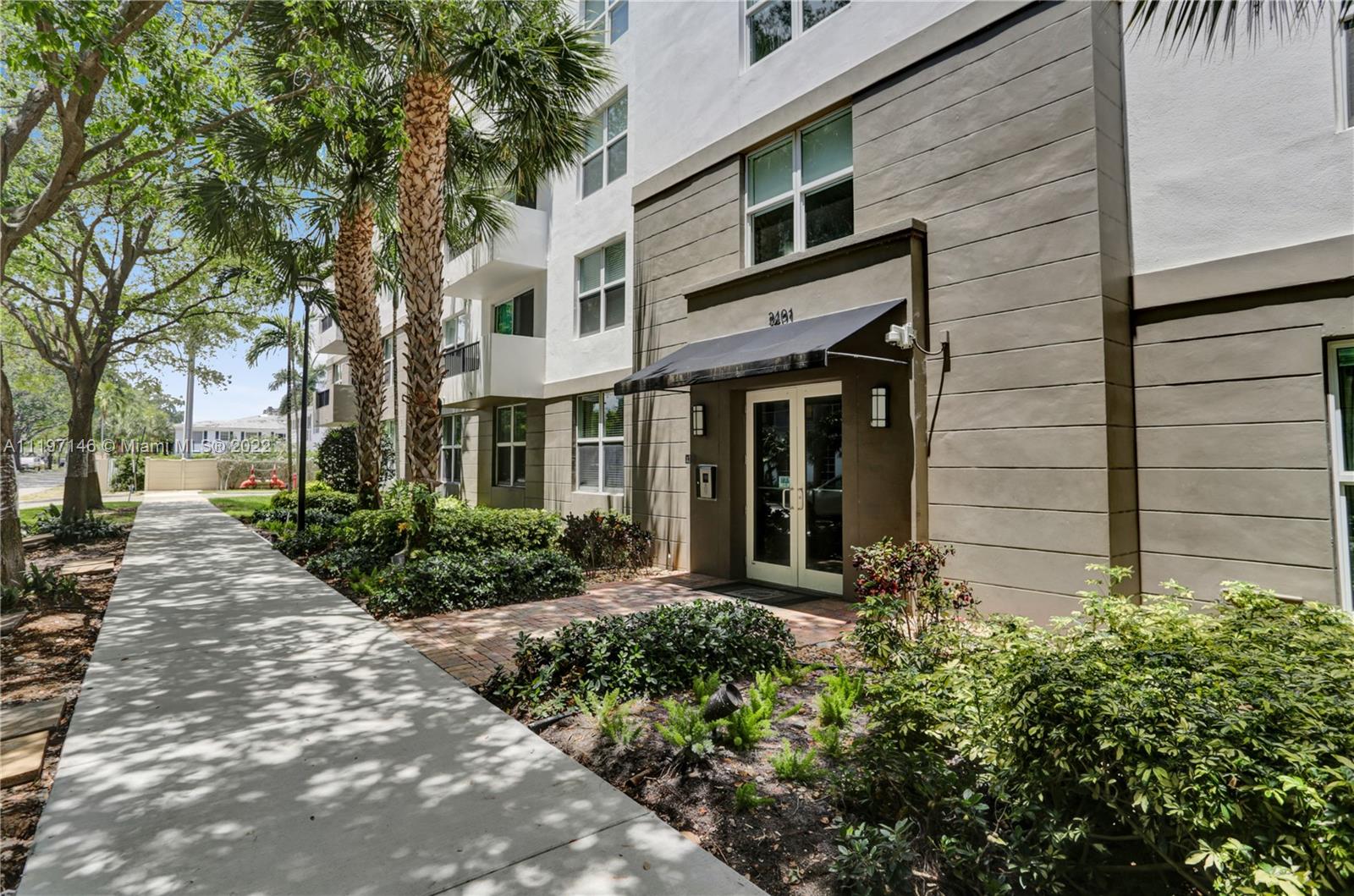 Imperial Point Fort Lauderdale, FL 33308 - Photo 34 of 37 a front view of a house with garden