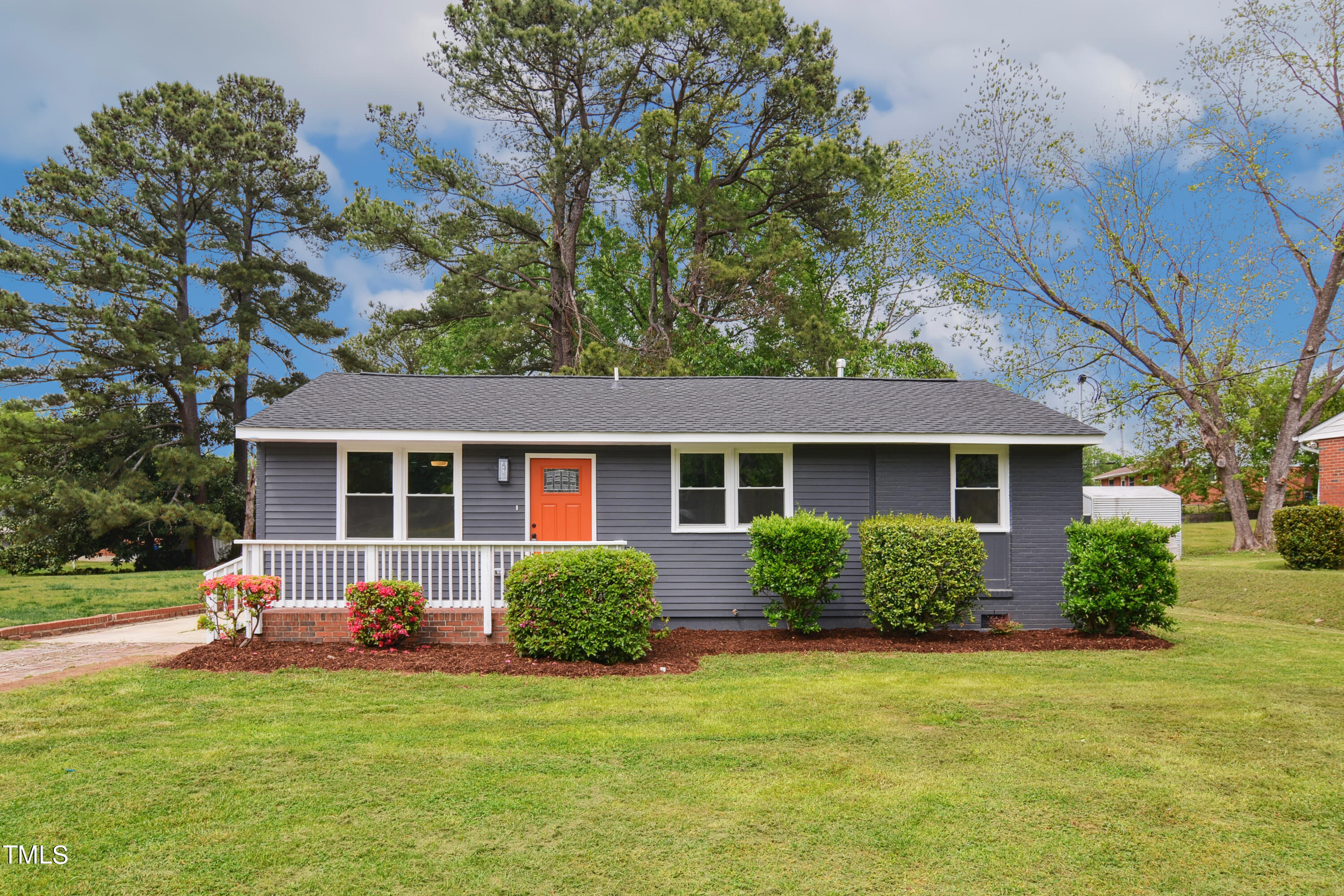 817 Newcombe Road Raleigh, NC 27610 - Photo 1 of 13 front view of a house with a yard