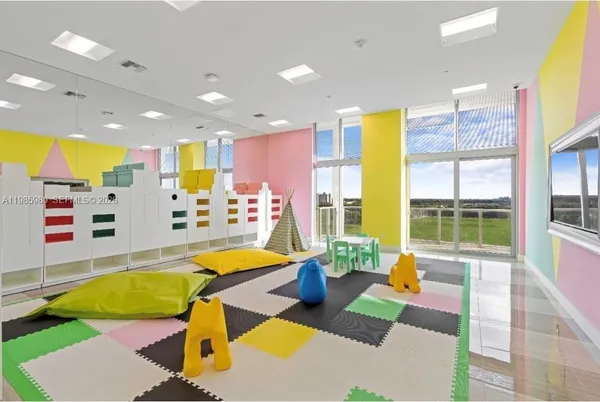 a swimming pool with a couch and table in it