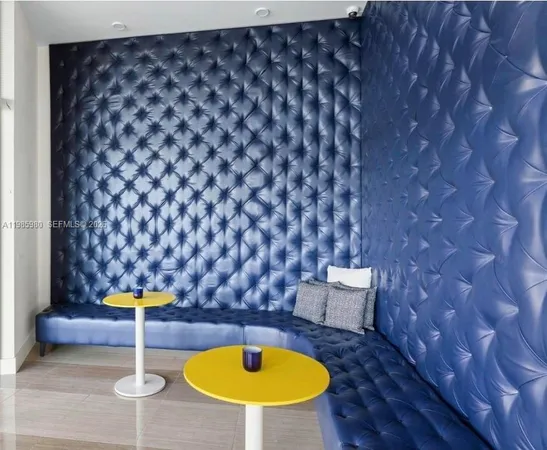 a swimming pool with a chairs