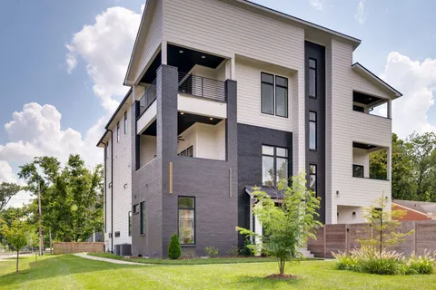 a front view of a house with yard