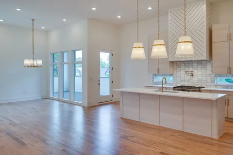a view of a balcony with wooden floor