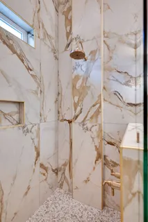 a view of balcony with wooden floor