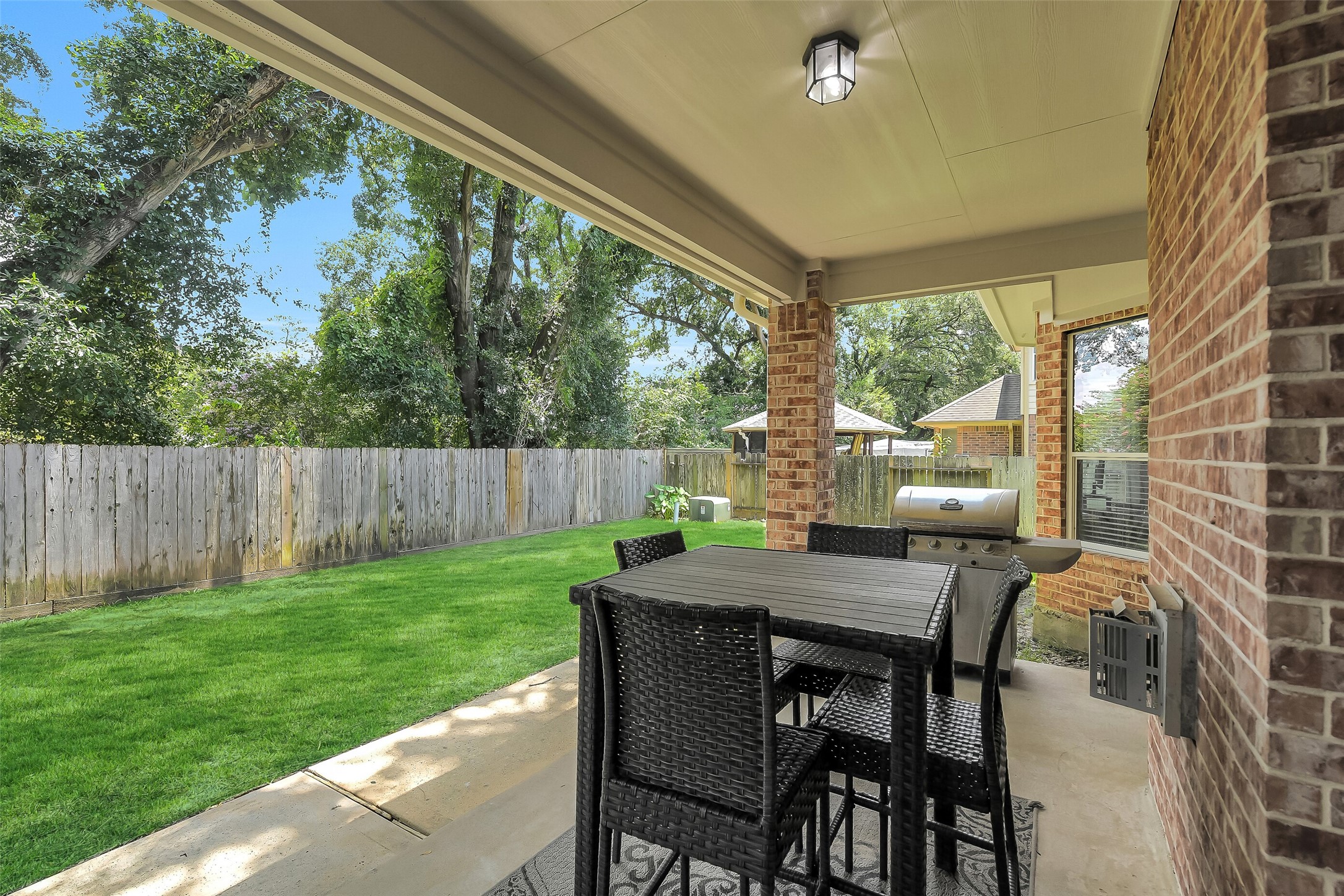 14906 Windsor Manor Houston, TX 77069 - Photo 29 of 34 Large covered back patio ~