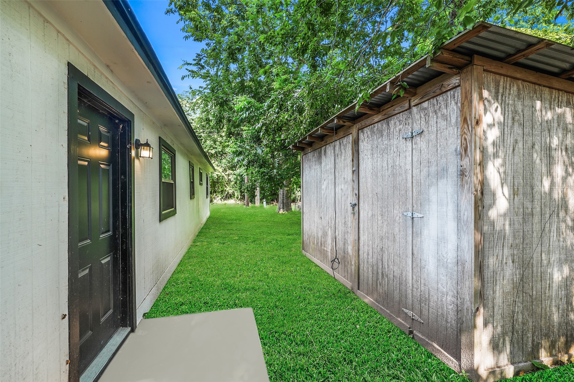 725 Lafayette Street Hempstead, TX 77445 - Photo 6 of 20 Storage shed provides additional space for lawn equipment and tools