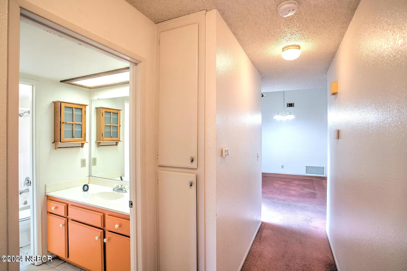 1352 Viola Way Lompoc, CA 93436 - Photo 11 of 30 a bathroom with a sink a mirror and a shower