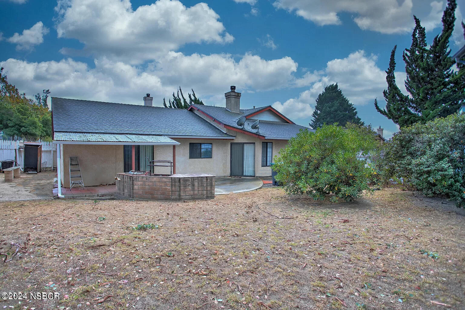 1352 Viola Way Lompoc, CA 93436 - Photo 27 of 30 a front view of a house with a garden