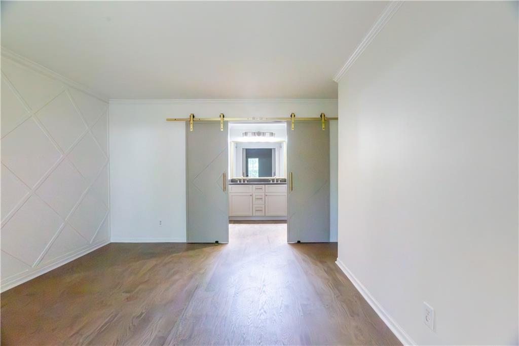 45 St Claire Lane Northeast Atlanta, GA 30324 - Photo 24 of 29 wooden floor in an empty room