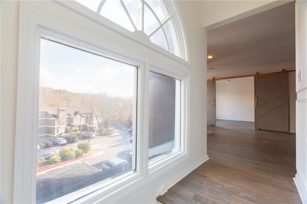 45 St Claire Lane Northeast Atlanta, GA 30324 - Photo 5 of 29 a view of a glass door with wooden floor