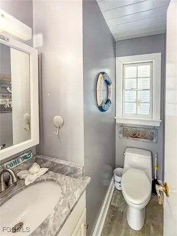 a view of a balcony with chairs