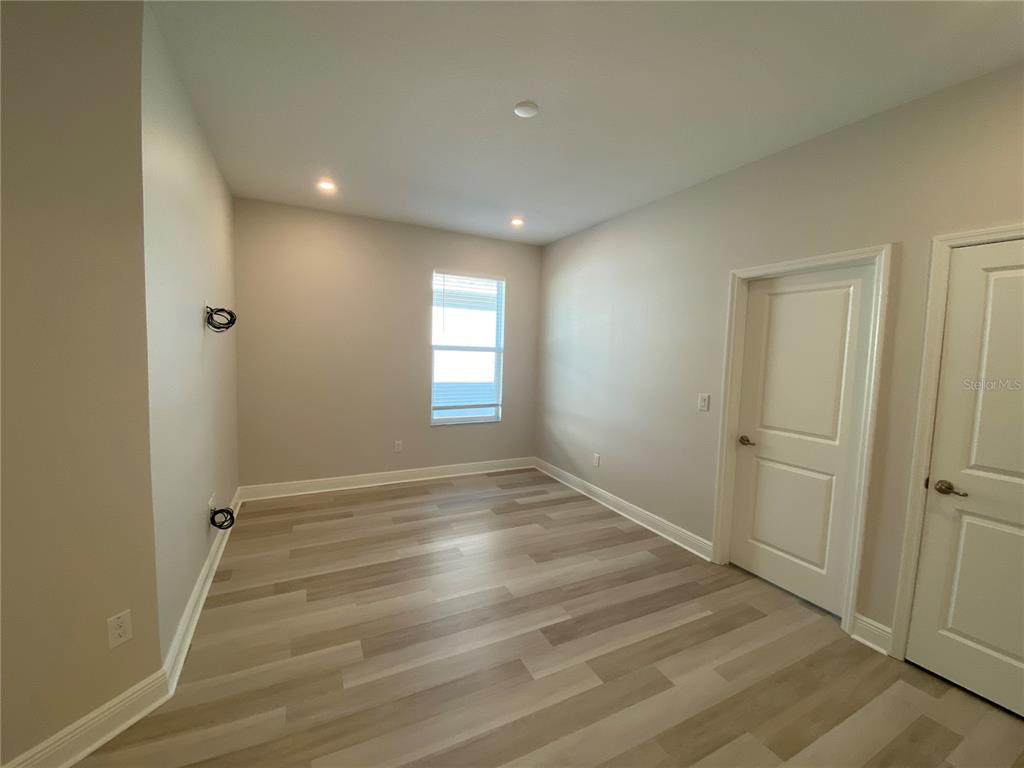 34273 Radley Way Wesley Chapel, FL 33545 - Photo 12 of 38 a view of an empty room and window