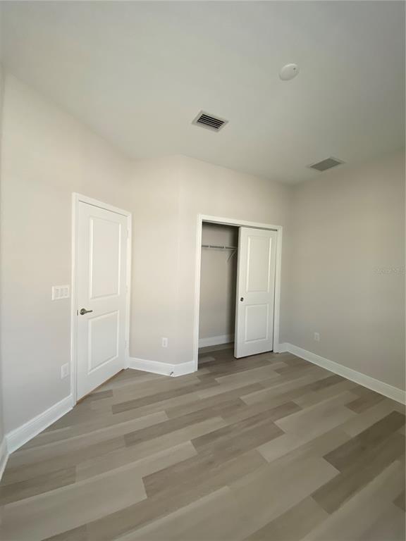 34273 Radley Way Wesley Chapel, FL 33545 - Photo 14 of 38 a view of an empty room