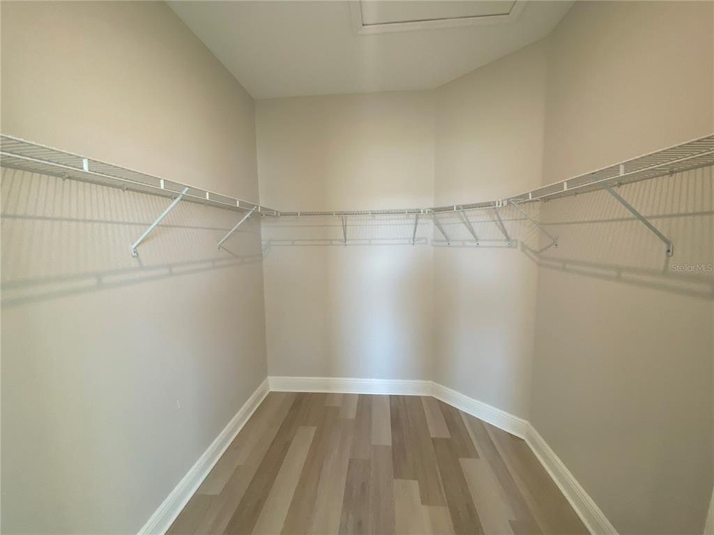 34273 Radley Way Wesley Chapel, FL 33545 - Photo 23 of 38 a view of a room with racks on the wall