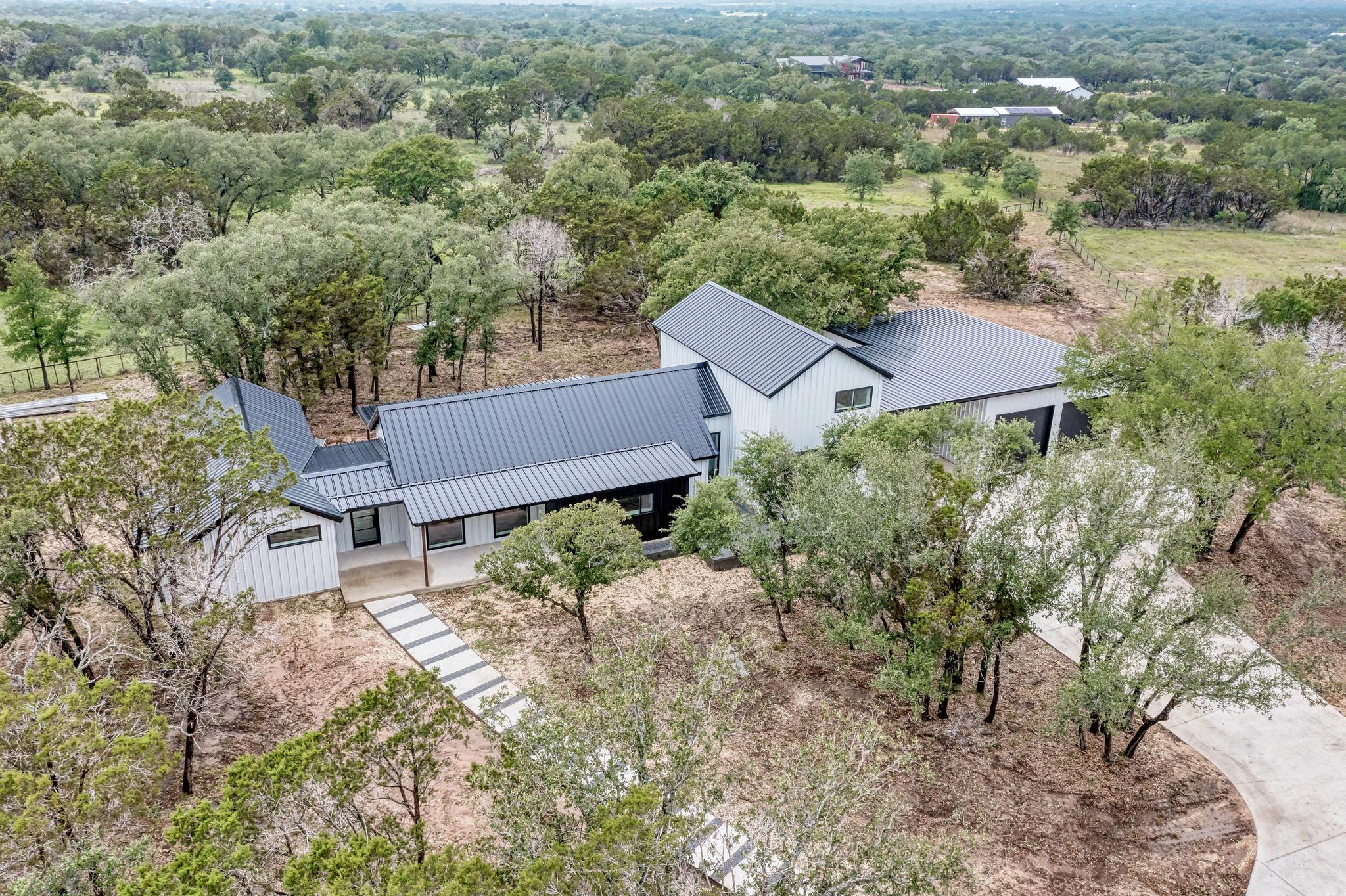 4190 West Fm 243 Bertram, TX 78605 - Photo 1 of 42 Aerial view of property, metal roof