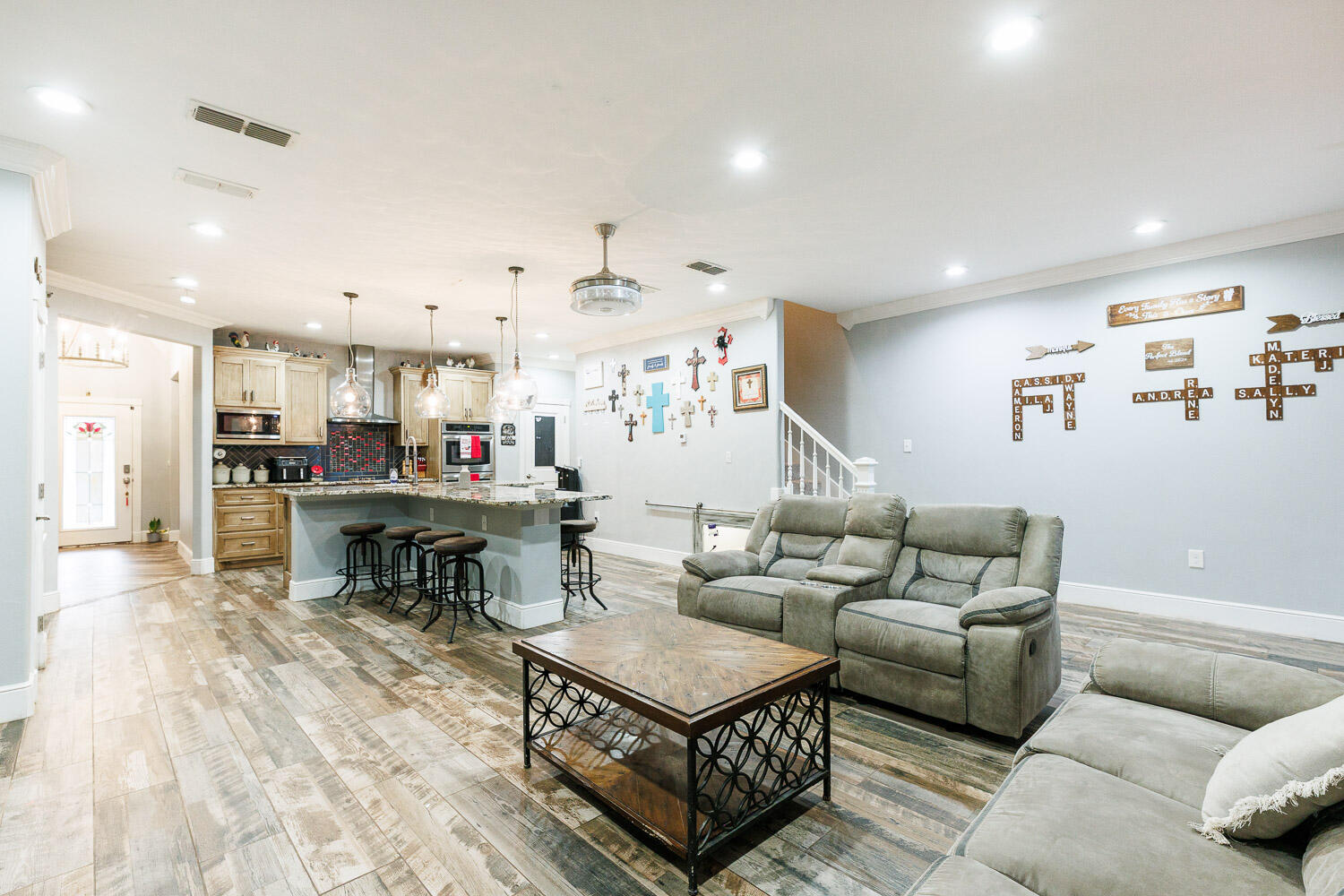 6523 East C R 6200 Lubbock, TX 79403 - Photo 18 of 86 a living room with furniture and kitchen view