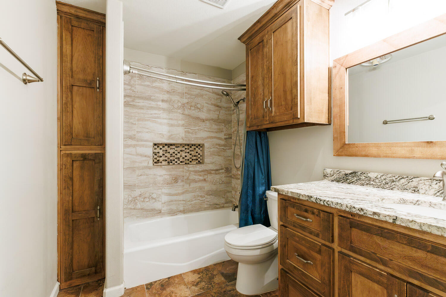 6523 East C R 6200 Lubbock, TX 79403 - Photo 45 of 86 a bathroom with a granite countertop sink toilet and shower