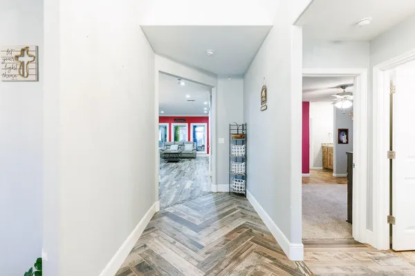 a kitchen with stainless steel appliances kitchen island granite countertop a stove a sink and a microwave