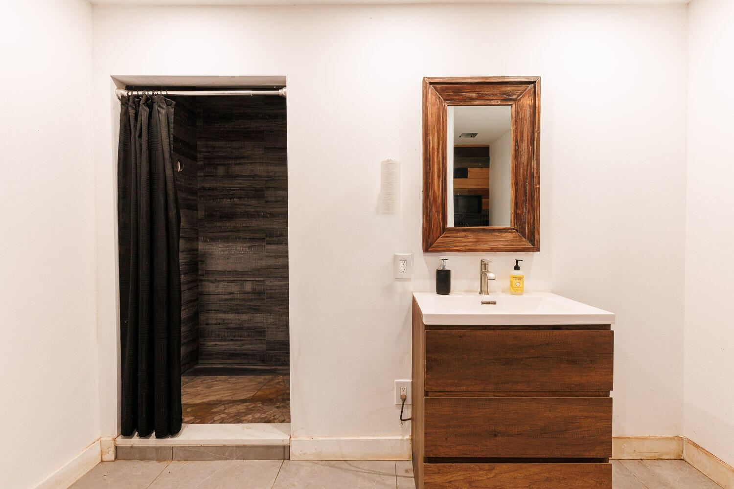 6523 East C R 6200 Lubbock, TX 79403 - Photo 76 of 86 a bathroom with a sink and a mirror
