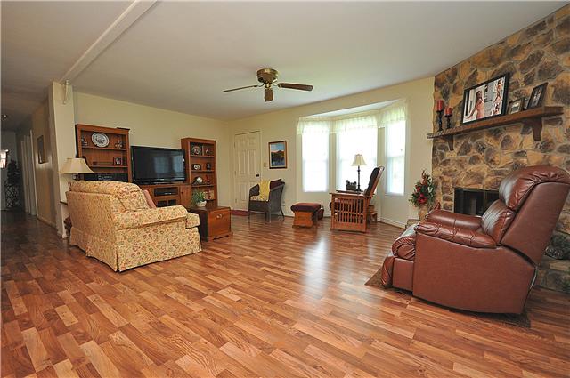 1280 A McCrary Road Lebanon, TN 37090 - Photo 4 of 20 a living room with fireplace furniture and a wooden floor