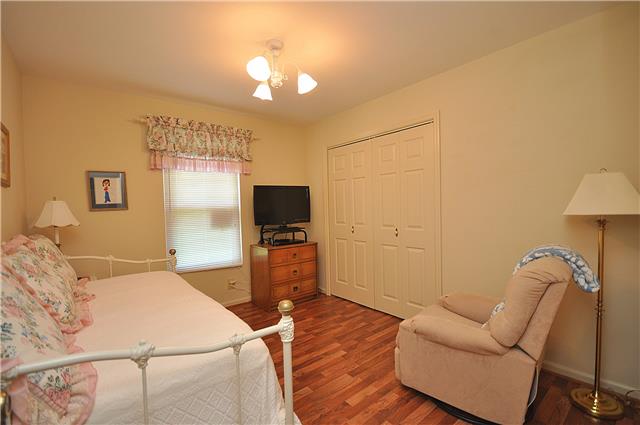 1280 A McCrary Road Lebanon, TN 37090 - Photo 7 of 20 a bedroom with a bed and a chandelier