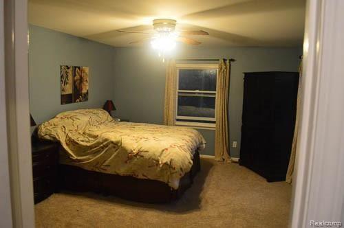 990 Dahlia Lane Rochester, MI 48307 - Photo 29 of 35 master bedroom with new carpet, and fresh colored paint