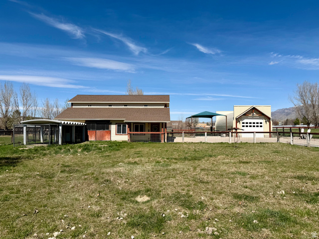 202 375 West Providence, UT 84332 - Photo 54 of 61 View of small front pasture and chicken run at the side of the barn
