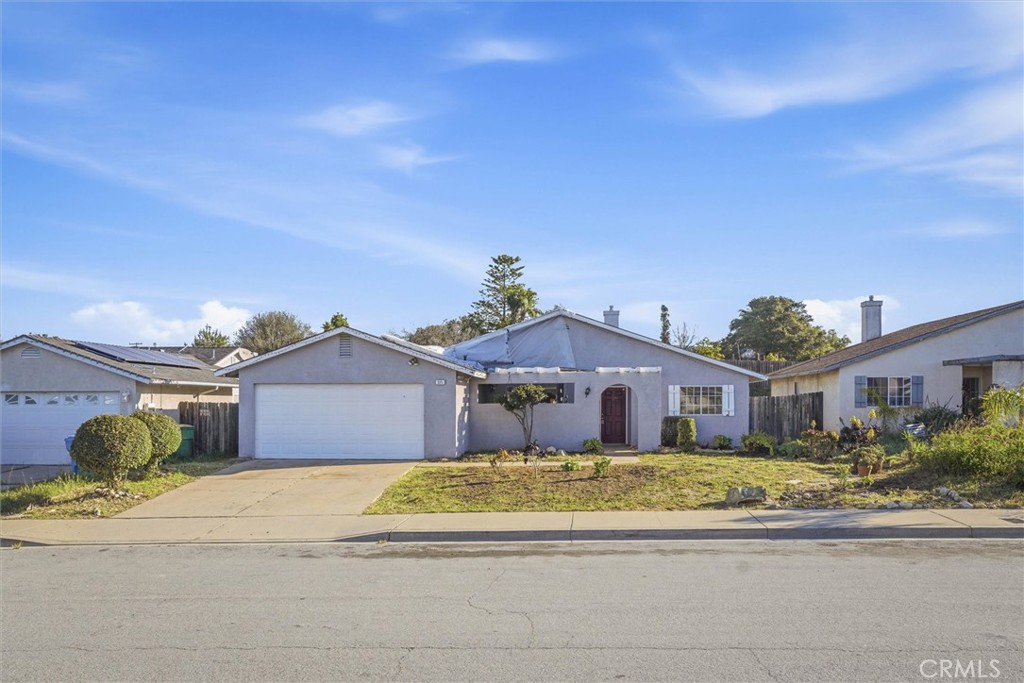 325 Black Hawk Way Nipomo, CA 93444 - Photo 1 of 1 a front view of a house with a garden